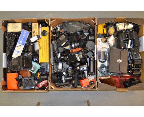 A Large Quantity of Small Accessories, including lens hoods, teleconverters, flashguns, table tripods, motor drives, flash br