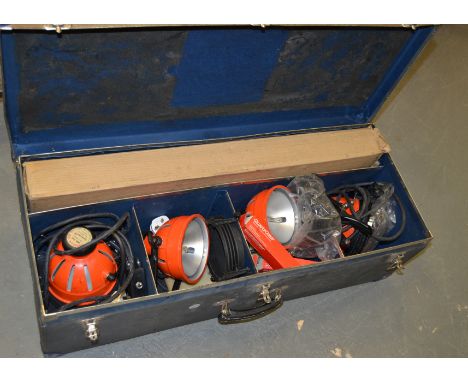 A Redhead Portable Lighting Kit, including four Ianiro Ianebeam 800 3142 lighting units and three telescopic stands in a larg