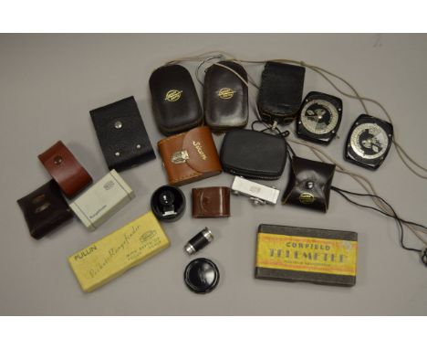 A Quantity of Small Camera Accessories, including exposure meters, exposure calculators, rangefinders and viewfinders