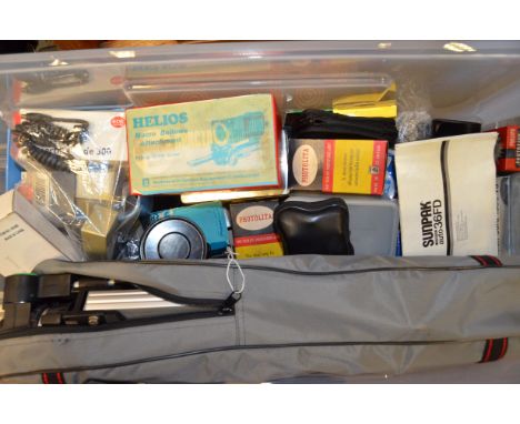 A Box of Photographic Accessories, including flashguns from Canon and Sunpak, a Slik tripod, a Helios Macro Bellows, a set of