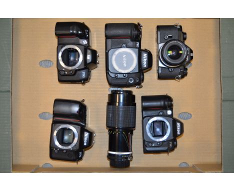 A Tray of Nikon 35mm SLR Bodies, a Nikon F100, a Nikon F80, a Nikon F70, a Nikon F60 together with a Nikon EM camera with a N