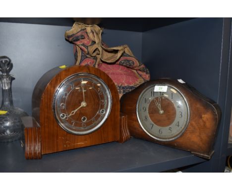 Two vintage Bentima wooden mantel clocks and a bag of clock components.