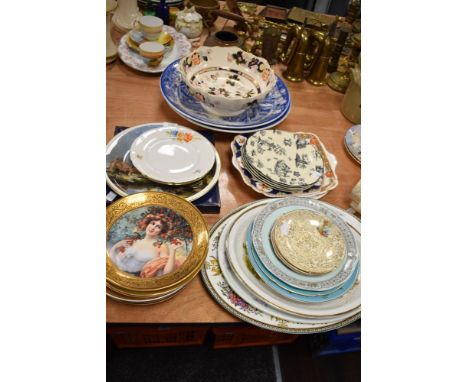 An assortment of vintage and modern plates, including Royal Worcester and more.