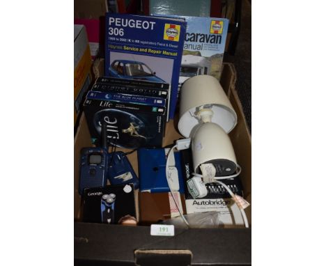 A mixed lot containing two Haynes manuals, a table lamp, Autobridge and card games and more.