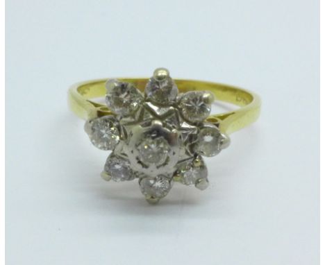 An 18ct gold and diamond ring, approximately 0.6 carat diamond weight, 4.5g, R 