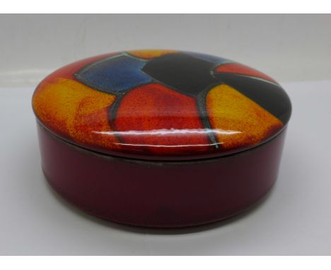 A Poole Pottery circular lidded pot 