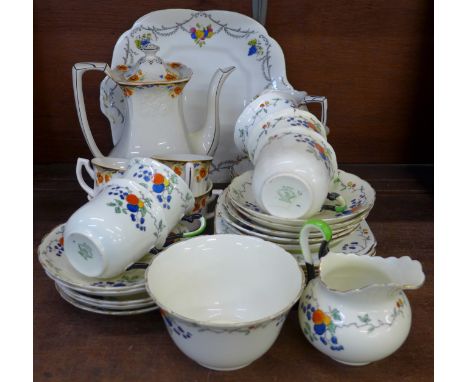 A part Myott Coralette coffee service and a Tuscan china tea service, three cups a/f 