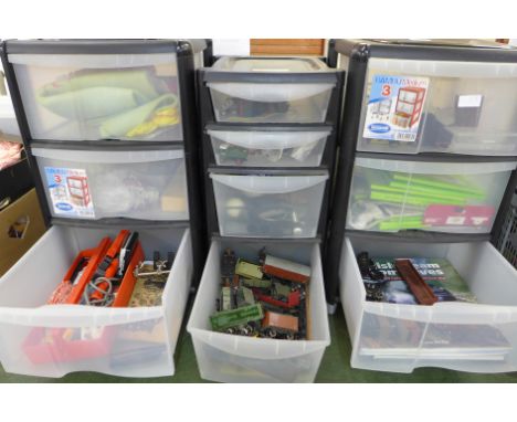A collection of model railway hobbyist tools, some model railway, Metcalfe buildings, etc., in three plastic storage boxes wi