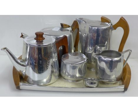 A Picquot ware four piece tea service, a Sona teapot and a tray 