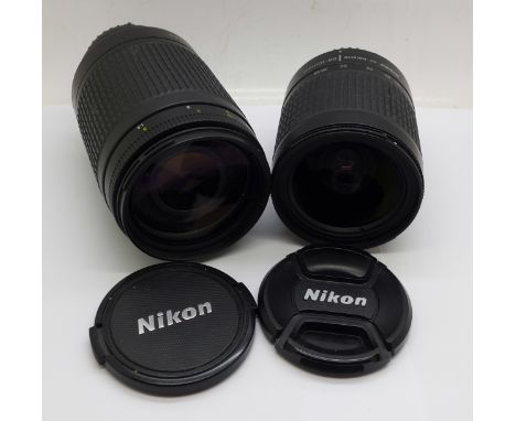 Two Nikon camera lenses; AF Nikkor 28-100mm f.35-5-6 G and 70-300mm f1.4-5.6 G 