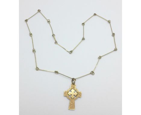 A late Victorian 9ct gold Celtic cross pendant, Chester 1895, on a plated chain, cross 0.9g and 16mm x 22mm 