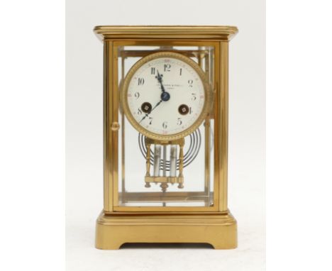Black, Starr & Frost, New York, a late 19th century American four glass brass mantel clock, white enamel signed dial, French 