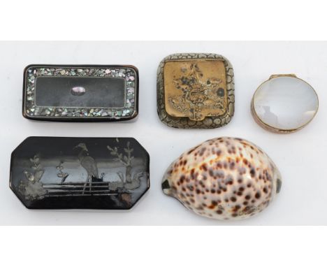 A Georgian Cowrie shell and brass snuff box, 6.5cm, two Papier Mache snuff boxes and two other boxes