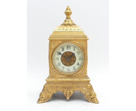 A late 19th century French cast gilt brass mantel clock, with pierced side panels, 29cm.Not working, movement very dirty, cas