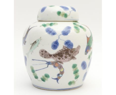 A Chinese Qing period ginger jar and cover, decorated with various fish including koi carp, a crab and a shrimp, blue two rin