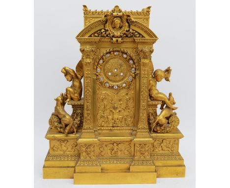 A large and impressive late 19th French gilt bronze mantel clock case, unsigned, no movement, the chapter ring with porcelain
