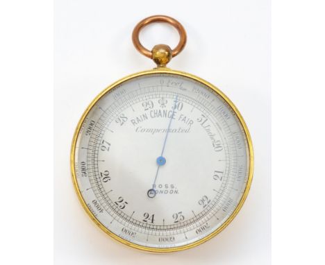 A pocket aneroid barometer by Ross, London, compensated for temperature, 4.5cms diameter, leather case