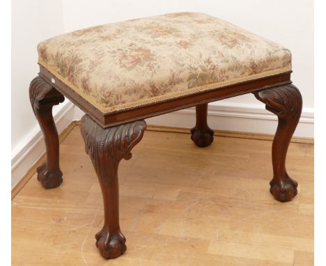 A large 19th century mahogany stool, having tapestry seat on cabriole supports with claw and ball feet, 62x50cm.