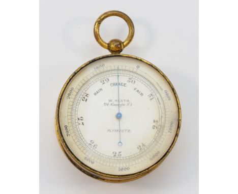 A pocket aneroid barometer by W. Heath, Plymouth, 4.5cms diameter.
