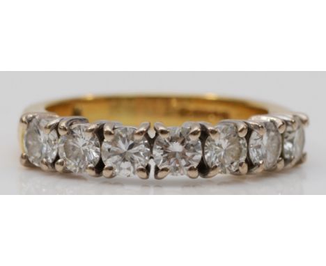 An 18ct gold half eternity seven stone brilliant cut diamond ring, claw set, H, 3.7g