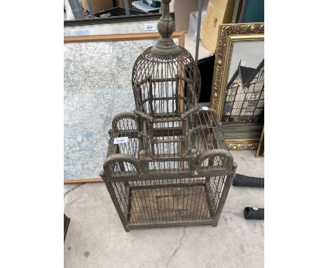 A VINTAGE AND DECORATIVE BIRD CAGE 