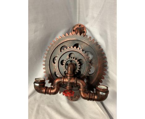 AN UNUSUAL TWIN WALL LIGHT IN AN INDUSTRIAL COG AND STEAM TAP DESIGN 