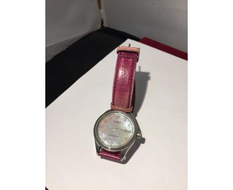A TIMEX CALENDAR WRISTWATCH IN WORKING ORDER 