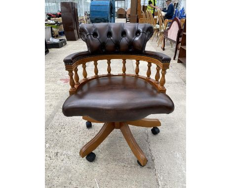 A REPRODUCTION BUTTON-BACK SWIVEL OFFICE CHAIR BY LANCASHIRE REPRODUCTION 