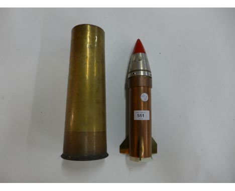 A TABLE LIGHTER IN THE FORM OF A ROCKET, THE TOP MADE FROM A SHELL FUSE, HEIGHT 30CM, AND A WORLD WAR II SHELL CASE (2) 