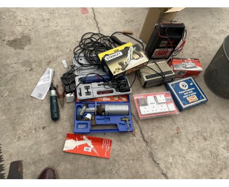 AN ASSORTMENT OF TOOLS TO INCLUDE A STANLEY NO.4 WOOD PLANE, A CAR BATTERY CHARGER AND A BLACK AND DECKER SANDER 