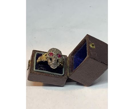 A MEMENTO MORI DIAMOND AND RUBY RING GROSS WEIGHT 3.9 GRAMS SIZE O/P WITH A PRESENTATION BOX 