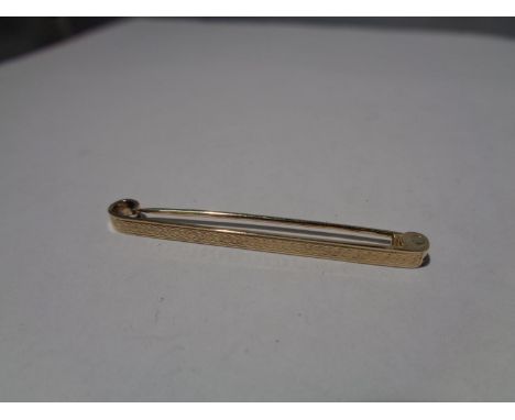 A MARKED 9 CARAT GOLD TIE PIN GROSS WEIGHT 1.7 GRAMS 