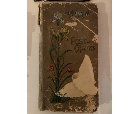 A VINTAGE POSTCARD ALBUM CONTAINING VARIOUS SCENES IN BLACK AND WHITE AND COLOUR 