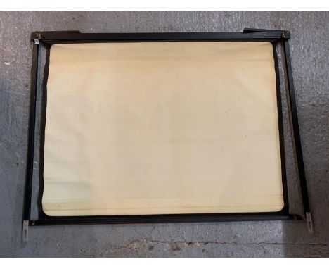 A VINTAGE PROJECTOR SCREEN 