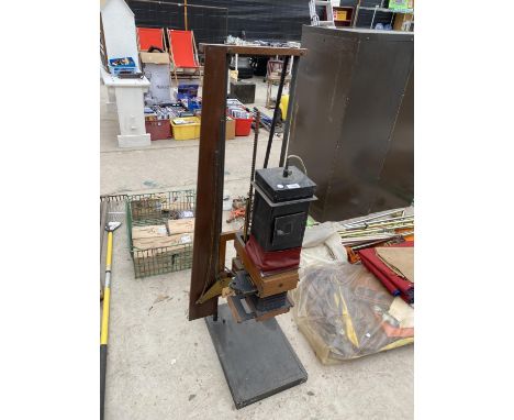 A VINTAGE J. LANCASTER &amp; SON OF BIRMINGHAM CAMERA LENS ON A STAND 