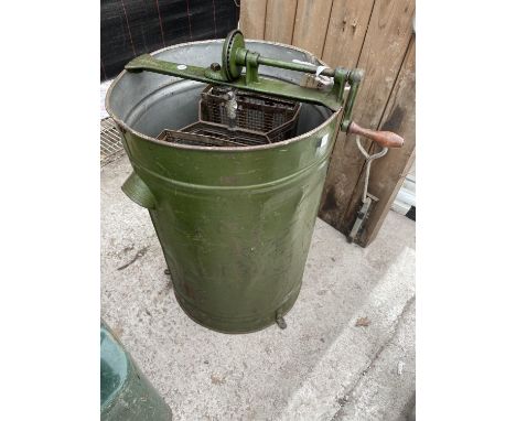 A VINTAGE HONEY EXTRACTOR 