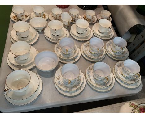 A SELECTION OF CHINA TEA SETS ,  INCLUDING SIX ROYAL ALBERT CHANTILLY DESIGN CUPS AND SAUCERS, SIDE PLATES AND SUGER BOWL 