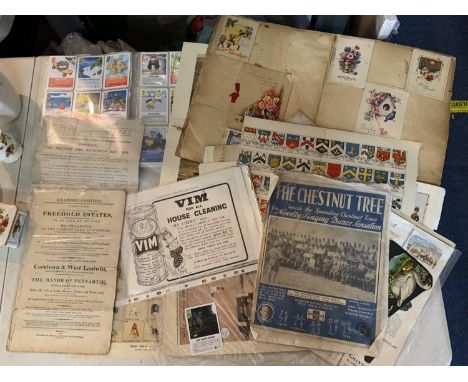 AN ASSORTMENT OF VINTAGE GREETINGS CARDS, NEWSPAPER CUTTINGS AND ADVERTISING PAPERS. 