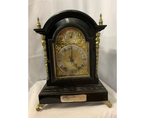 A VICTORIAN EBONISED BRACKET CLOCK WITH SILVERISED DIAL, GILDED DECORATION AND PIERCED SIDE PANELS, HOUR AND QUARTER CHIMING 