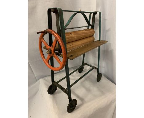 A MINATURE VINTAGE MANGLE 