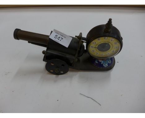 A NOVELTY CANON THEMED ALARM CLOCK 