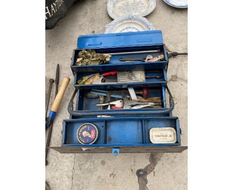 A METAL TOOL BOX WITH AN ASSORTMENT OF TOOLS TO INCLUDE ADJUSTABLE SPANNERS, MOLE GRIPS AND A BRACE DRILL ETC 