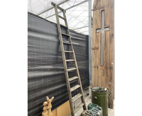 A VINTAGE 12 RUNG WOODEN LADDER 