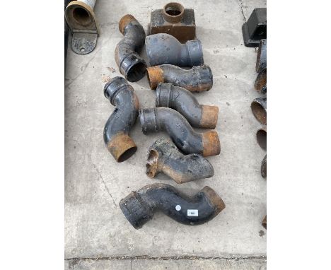 A CAST IRON GUTTER HOPPER AND AN ASSORTMENT OF DOWN SPOUT SECTIONS 