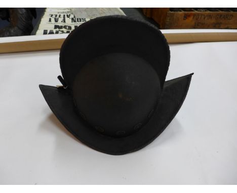 A MORION HELMET WITH BRASS DECORATION, LENGTH 38CM, HEIGHT 28CM, WITH PLUME SOCKET 