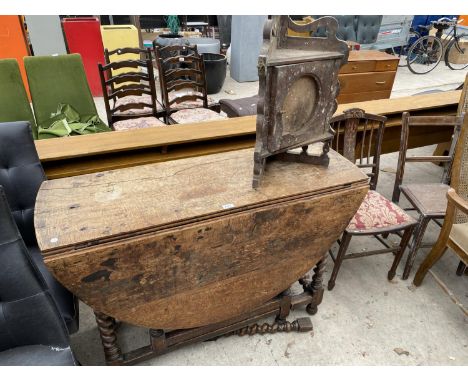 A GEORGIAN OVAL GATE LEG DINING TABLE ON BARLEY TWIST LEGS AND ONE END DRAWER 56 INCHES X 47 INCHES 