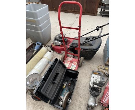 A MAKITA GRINDER AND A TROLLEY 
