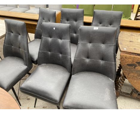 A SET OF SIX BLACK ROMODESIGN BUTTON-BACK FAUX LEATHER CHAIRS ON BLACK TUBULAR FRAMES