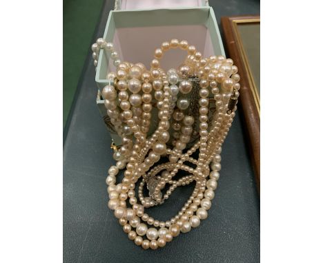 A BOX OF PEARL STYLE NECKLACES 
