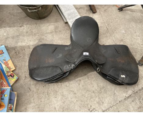 A LEATHER HORSE RIDING SADDLE 